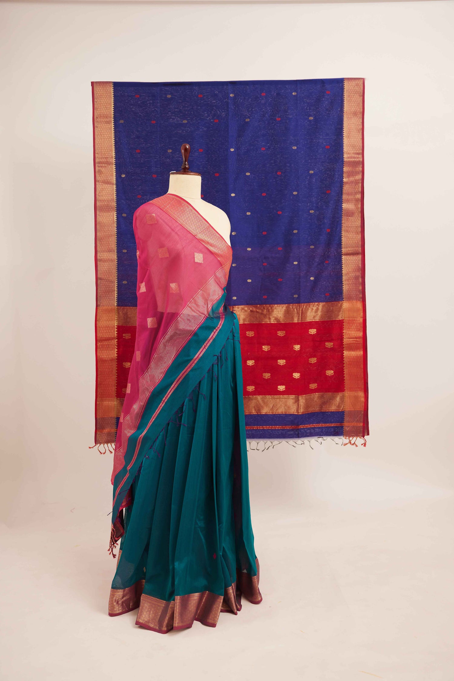 Turquoise Maheshwari Cotton Silk Saree with Gold Buttas & Pink Zari Border