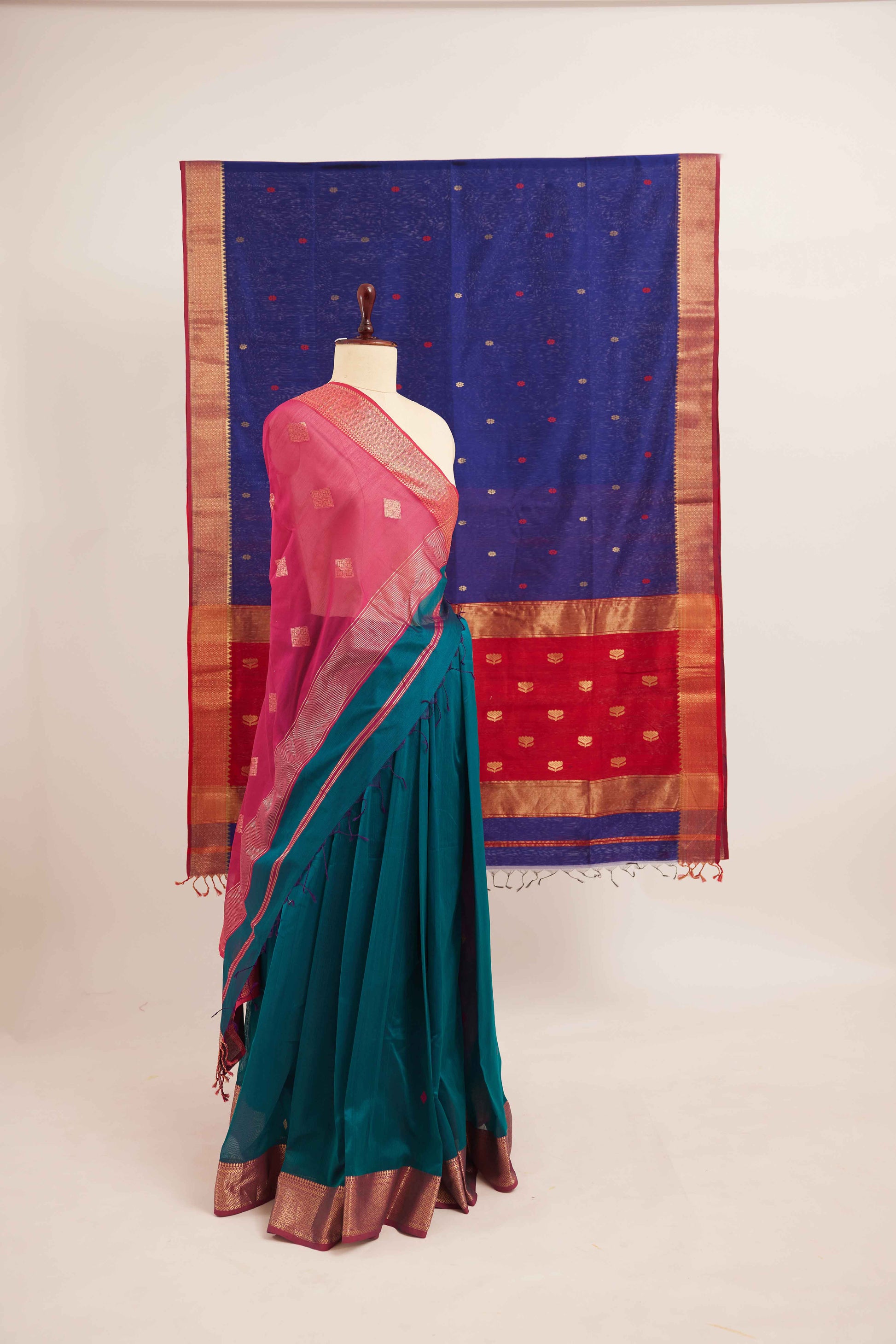Turquoise Maheshwari Cotton Silk Saree with Gold Buttas & Pink Zari Border