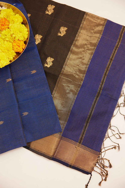 Blue Maheshwari Tissue Silk Saree with Gold Buttas & Black Zari Border